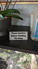 Please Sanitize Before Holding the Baby Sign