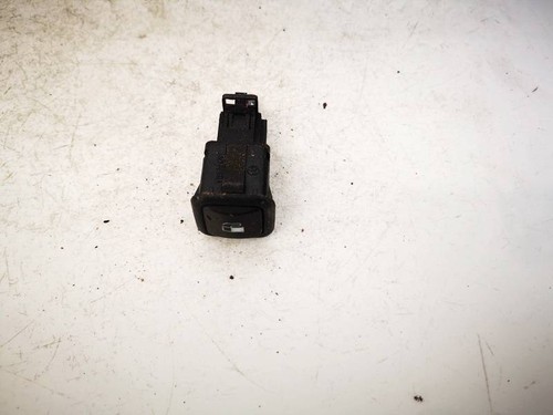 Bouton interrupteur de trappe à essence