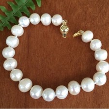 14K CULTURED PEARL BRACELET - 10 MM EACH - 7 IN