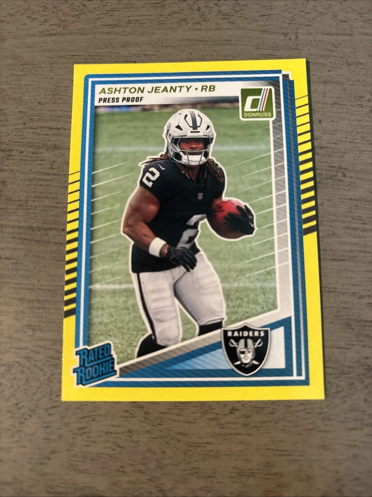 2025 Panini Donruss - Rated Rookie Ashton Jeanty #305 Press Proof Yellow (RC)
