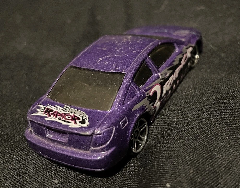 Coche cuádruple Hot Wheels 2002 Saturn Ion TM SC Raptor púrpura  Foto 2 de 2