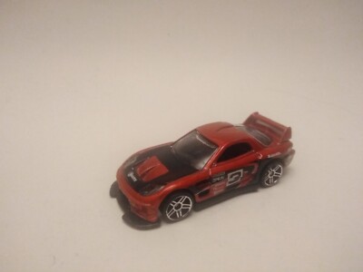 Hot Wheels 24/Seven red diecast Drift Kings 2006 car in 1/64 scale