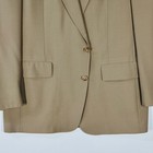 Ivory gold Austin Reed men's blazer with notch lapels, front button closure, and two front flap pockets, USA made label visible.