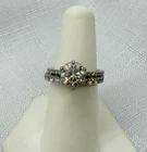 Gabriel and Co. Round Moissanite Hidden Halo Platinum Engagement Ring and Band