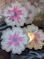 Set of 4 pretty, cork backed coasters made of epoxy resin.  Blinged out.