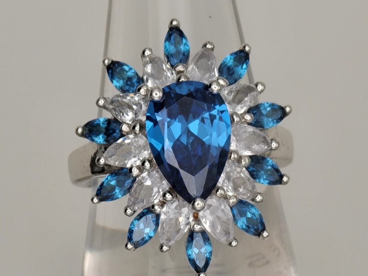 JTV BLUE APATITE AND WHITE DIAMOND SIMULANTS RHODIUM OVER STERLING SILVER  RING