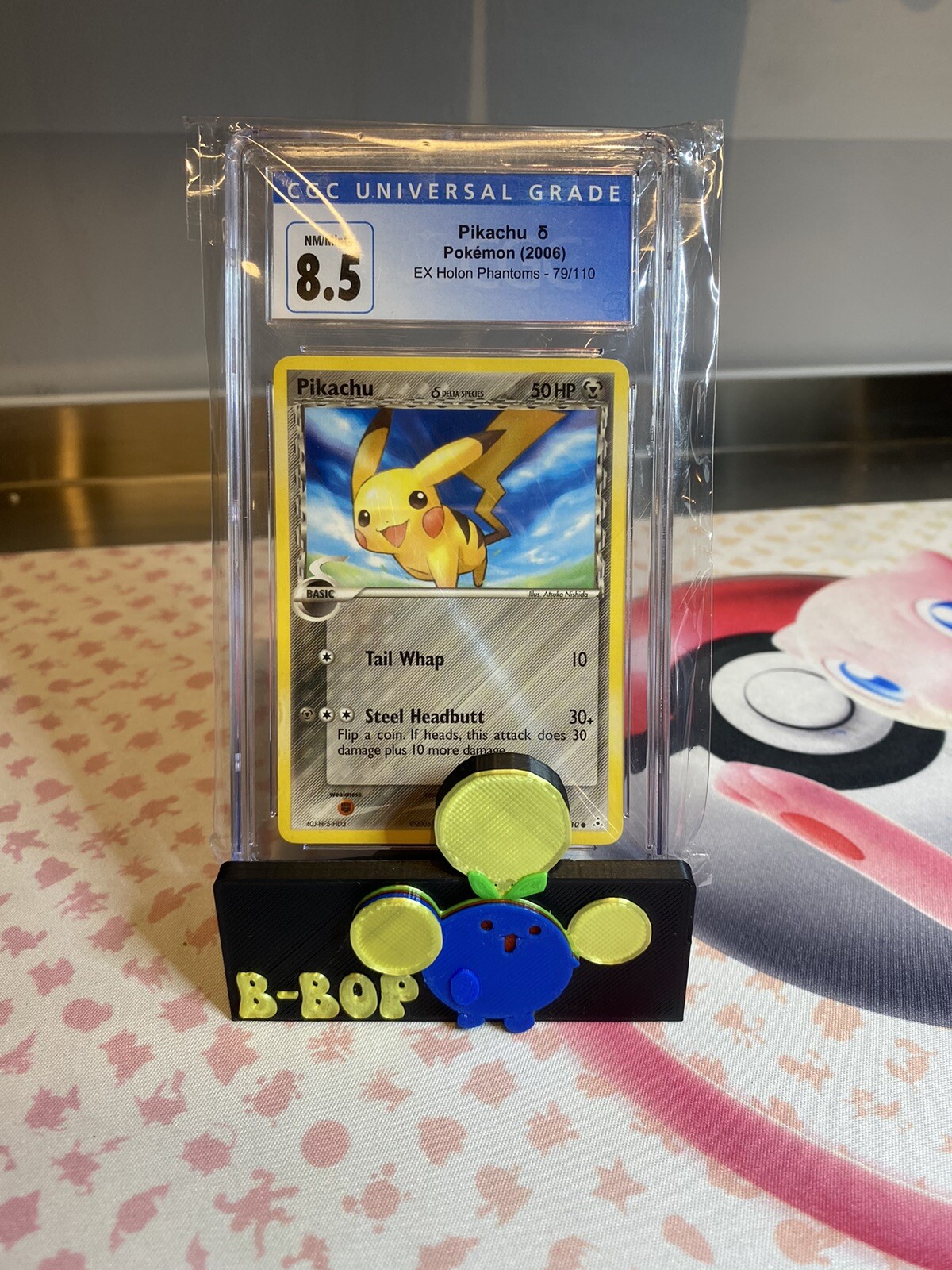 Pokemon 2006 Pikachu 79/110 CGC 8.5 Holon Phantoms