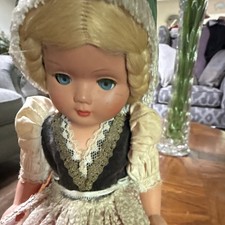 A German celluloid doll in traditional folk costume, likely mid-20th century.