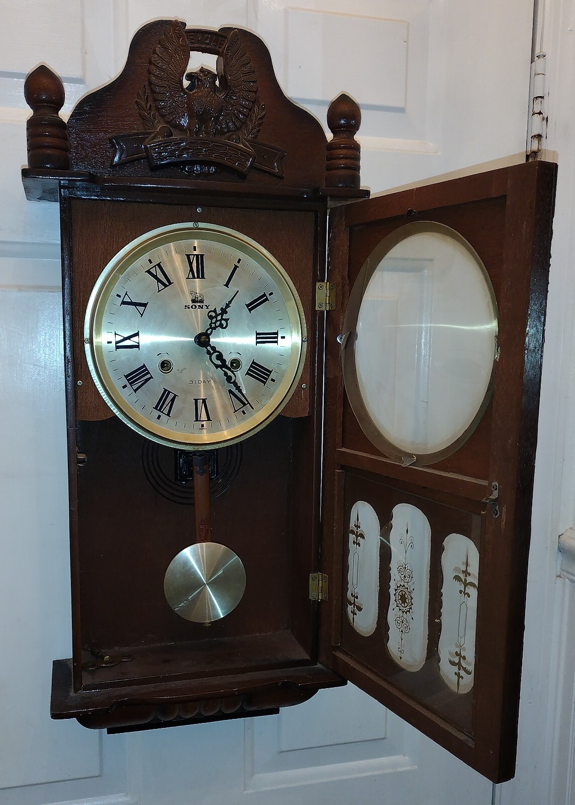SONY WALL CLOCK 31 DAY WIND UP WITH PENDULUM & KEY WOOD EAGLE TOPPER eBay