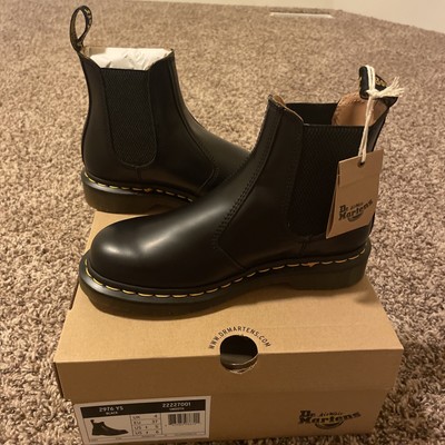 black boots yellow stitching