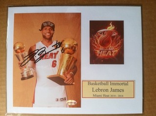 Autograph LeBron James 5x7color photo matted to 8x10 w/coa