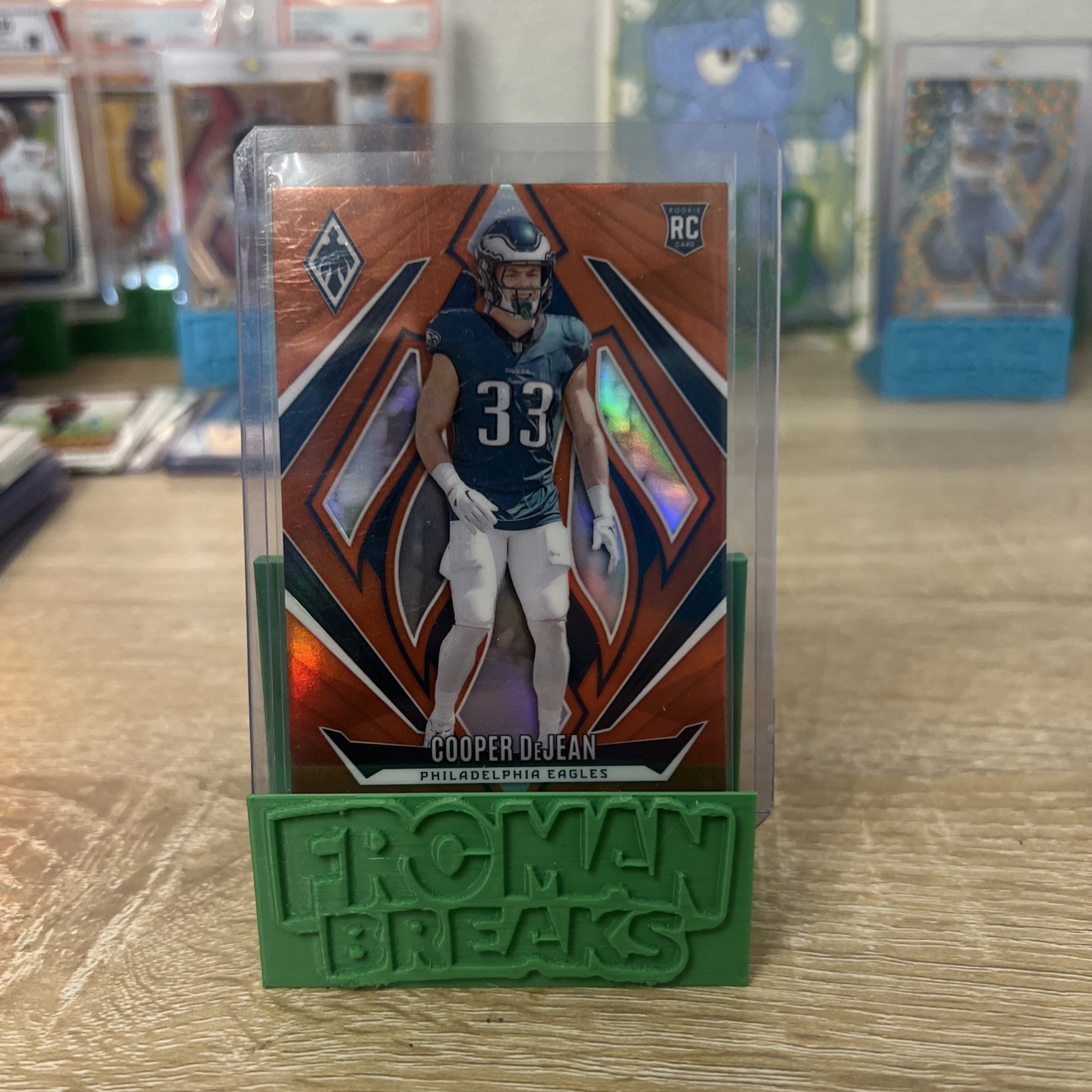 2024 Panini Phoenix - Rookies Cooper DeJean #171 Orange (RC)