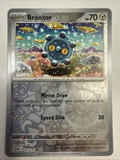Bronzor 144/197 Reverse Holo 2023 Pokemon Obsidian Flames Card Shinji Kanda Art