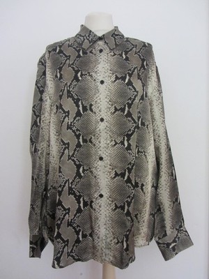 Elegant blouse by Khaite in size 6 (DE 40) 100% silk excellent condition!!!
