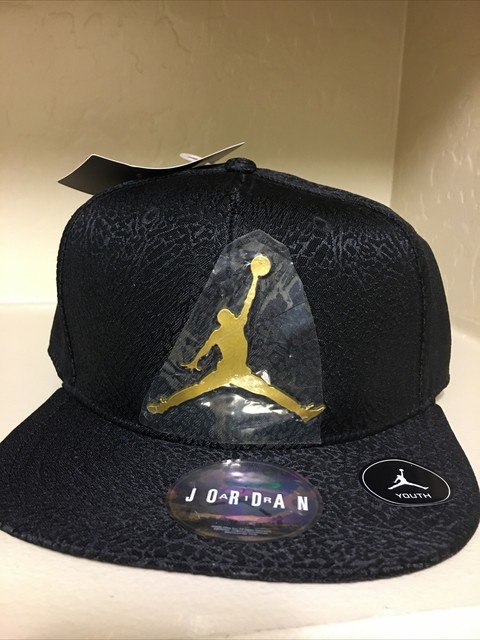 all black jordans with gold logo