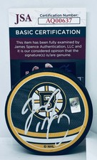 Jim Montgomery signed Boston Bruins Reverse Retro Puck autographed #2 JSA COA
