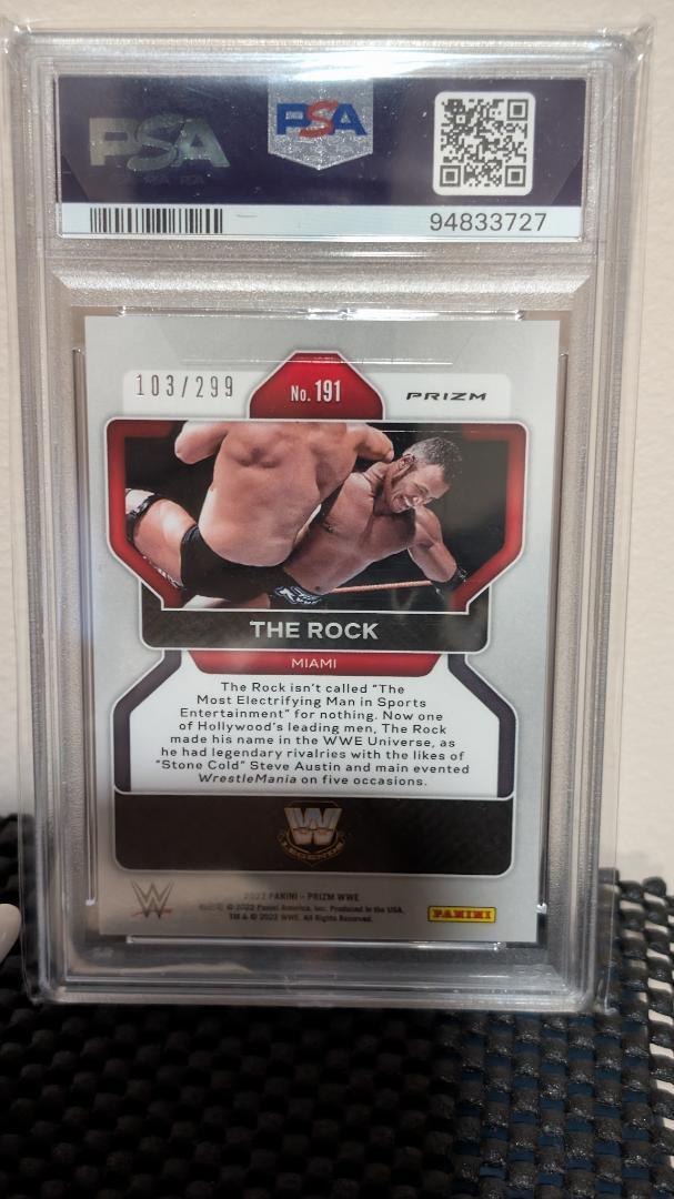 Prizm Red WWE Rock PSA 10 numbered