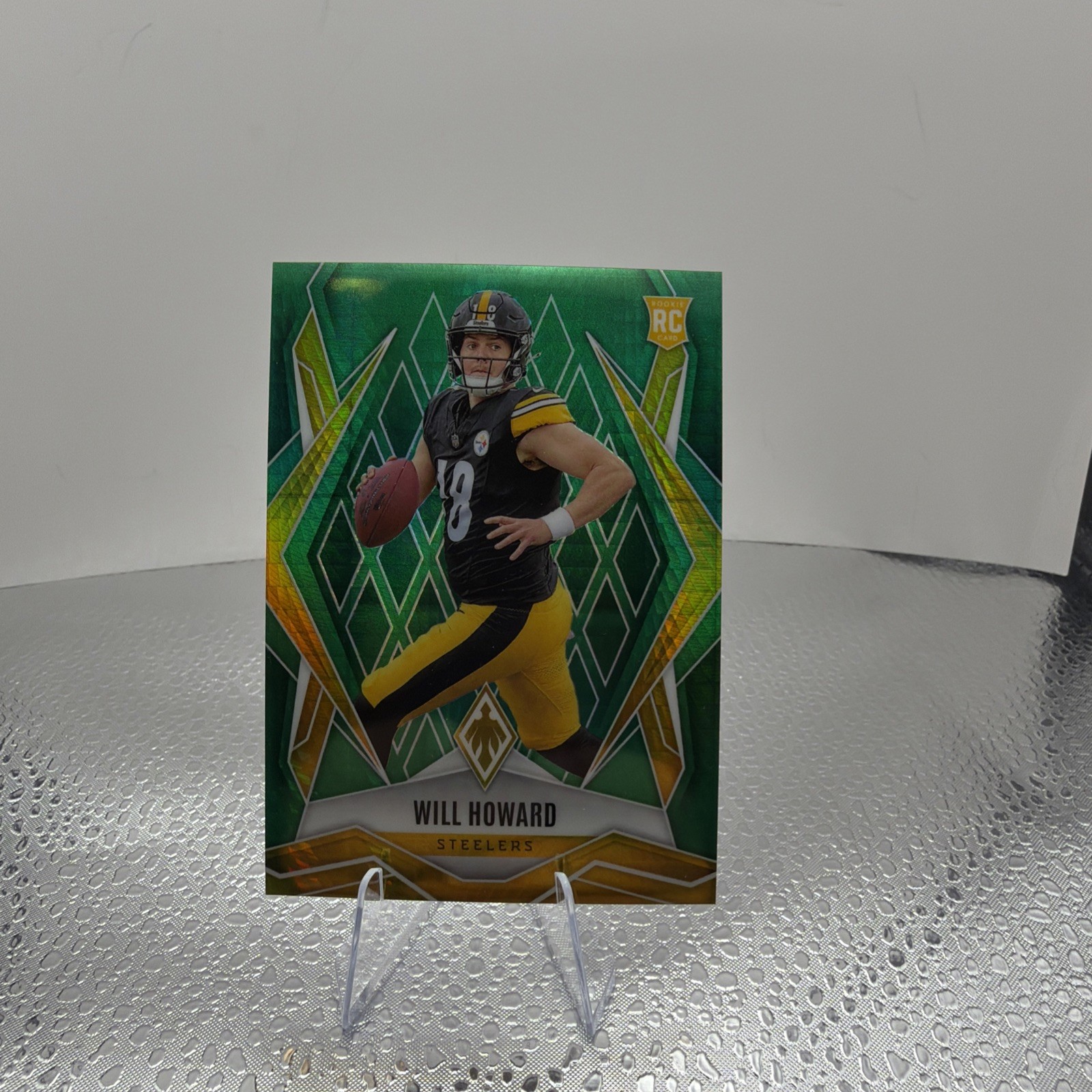 2025 Panini Phoenix - Rookies Will Howard #165 (RC) Green Hyper /149