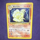 1999 Base Set Ninetales Holo Pokémon card (#12/102) in protective hard case.