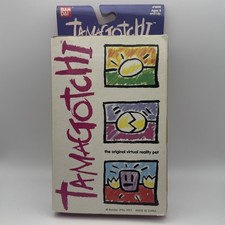 Bandai 1997 Tamagotchi Virtual Reality Pet w/ Original Box Purple/Pink - works 