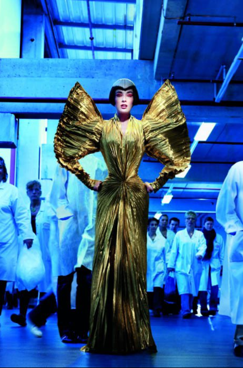 mugler gold dress Margot Robbie Wore a Gloriously Corset With a Bronze Robeand Nothing Else Mugler Gold Dress | TikTok