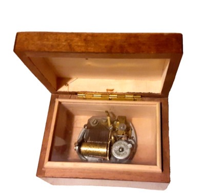 Vintage wooden musical small box plays the petite valse in good condition