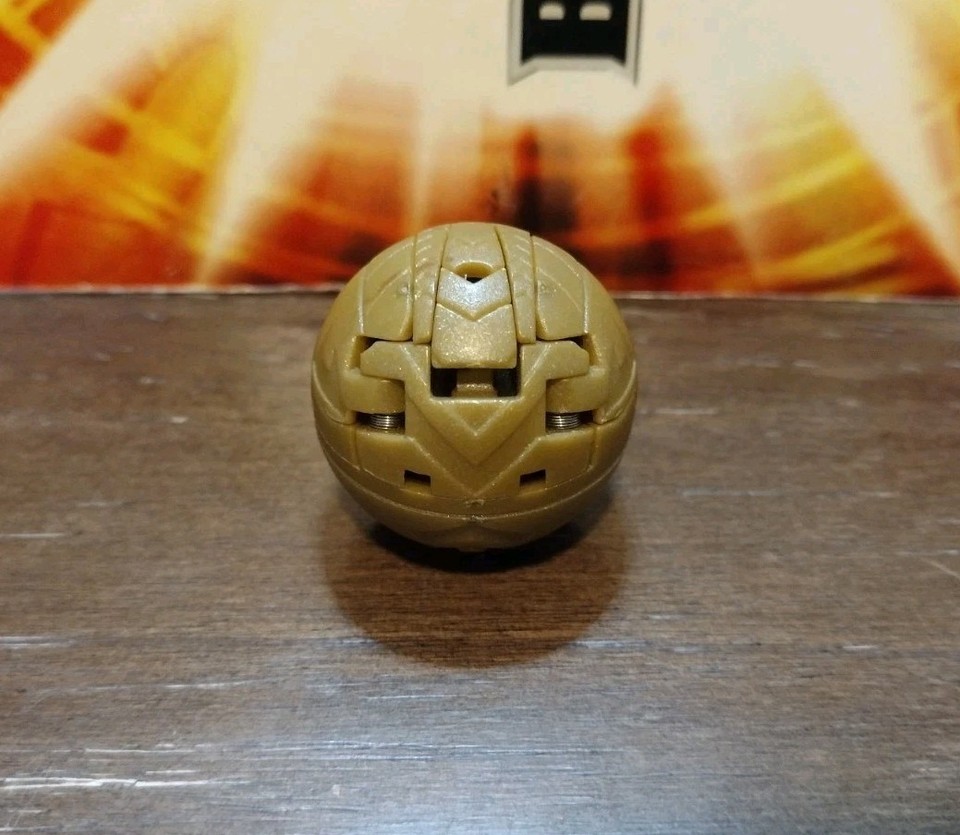 Bakugan B1 Pyrus bronze Bakou attaque bronze or DRAGONOÏDE CLASSIQUE