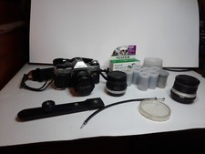 Vintage Canon AE-1 Camera  Accessories Lot Lens  Film