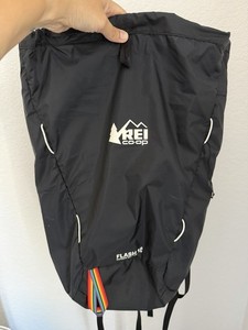 REI Flash 18 Backpack Outside With Pride