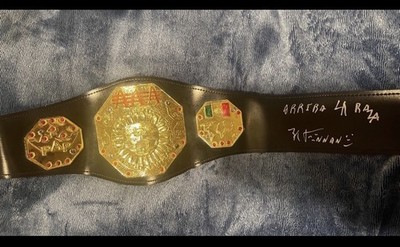 WWE konnan signed AAA toy belt & inscribed ARRIBA LA RAZA