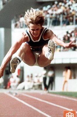 Long jumper Angela Voigt jumps into pit at Olympic Stadium Montreal- Old Photo