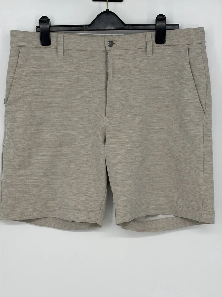 Pantalones cortos de rendimiento beige para hombre Perry Ellis - talla 38 Foto 2 de 4