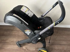 DOONA  ALL IN ONE STROLLER + LATCH SEAT. Stroller And Base.