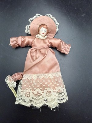 Vintage Meravic Blue Springs MO Taiwan Porcelain Head Hanging Doll Pink