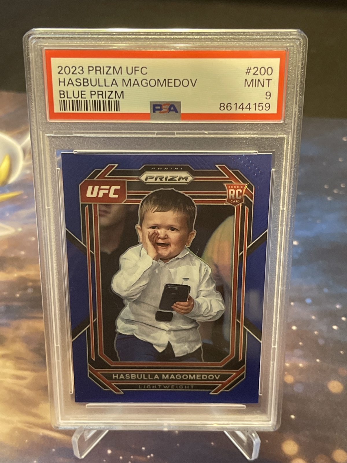 2023 Prizm UFC Hasbulla Magomedov Blue Prizm /175 ROOKIE #200 PSA 9