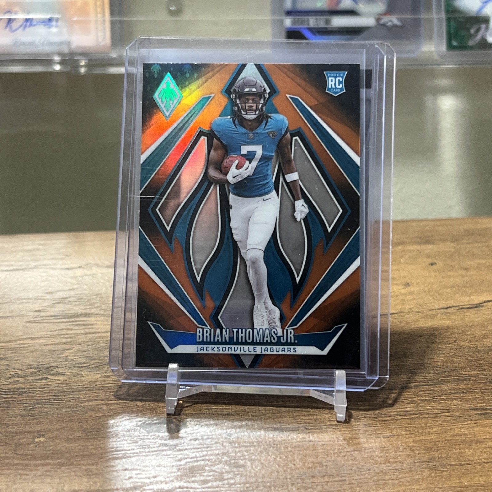 2024 Panini Phoenix - Rookies Brian Thomas Jr. #164 Orange (RC)