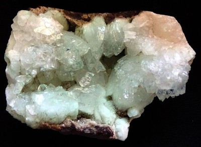 Green Apophyllite crystal flower formation on matrix mineral specimen