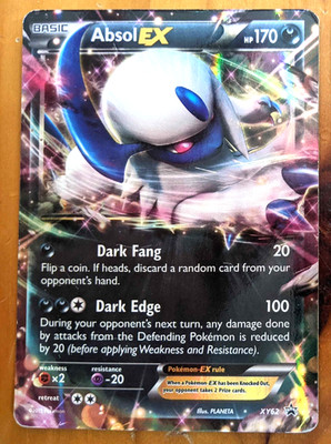 Absol ex pokemon card. Moderately played.