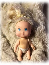 Vintage 1990 Tyco Miniature Quint Baby Doll numbered 3 Yellow Ribbon