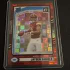 2024 Panini Donruss - Jayden Daniels #389 Optic Preview Red Pandora Prizm (RC)