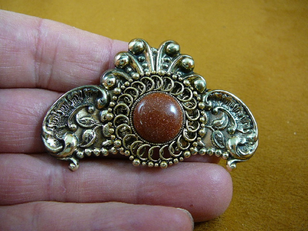 BB310-4) Orange Goldstone stone circle scrolled flower brass