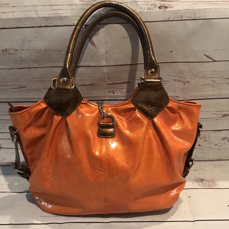 Bolso de mano para mujer cartera naranja bronce borla nuevo sin etiquetas Foto 3 de 4