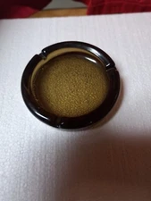 Vintage round glass ashtray color brown with gold tint or amber brown 