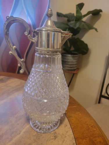 vintage clear glass decanter with silver plate 