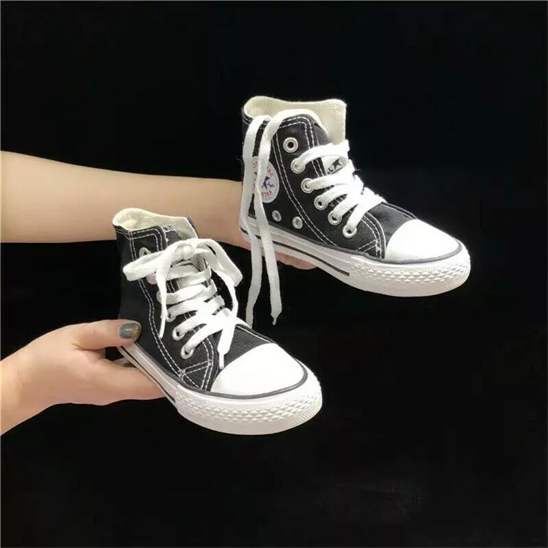 Kids black converse shop trainers