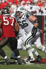 Guard Alan Faneca New York Jets blocks against the Tampa Bay Bucca- 2009 Photo 1