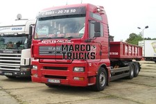 Truck photo MAN TGA tipper Germany red NESTLER Containerdienst NESTLER NE #c4lv
