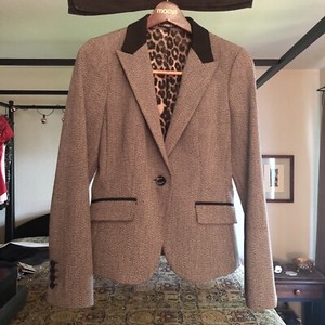 black blazer with leopard print lining