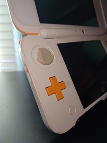 [READ DESCRIPTION] White/Orange Nintendo New 2DS XL, Partially Damaged, Works