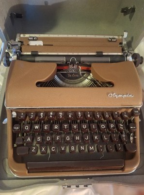 Brown Olympia DeLuxe SM3 Typewriter ( New) ALL ORIGINAL 